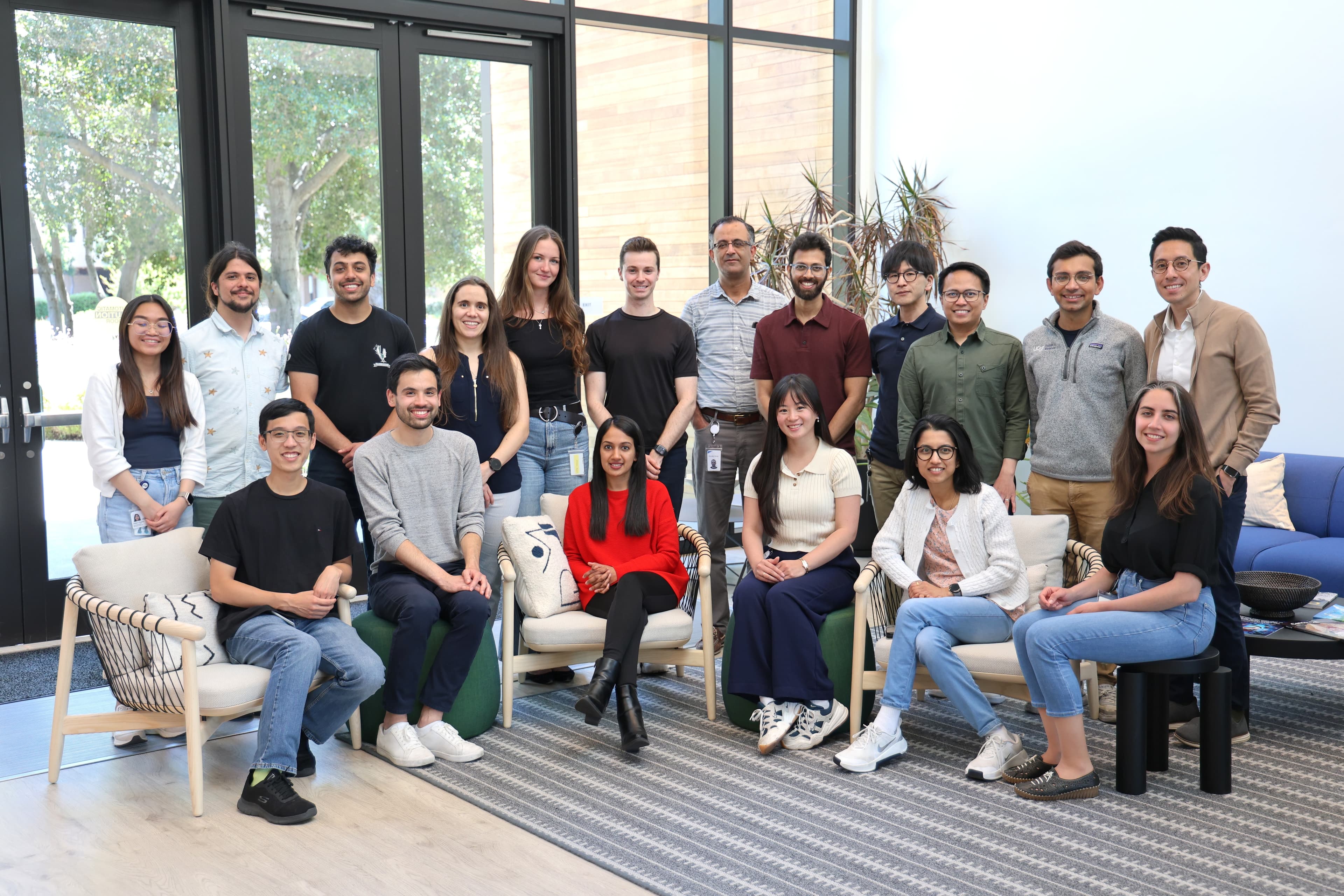 Joint photo of Jain lab members located across Arc Institute and Gladstone Institutes.